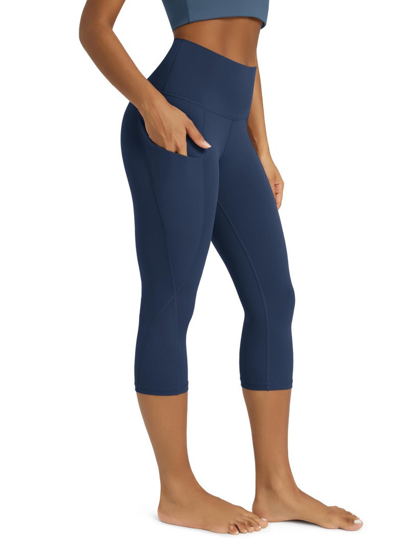 ODODOS Women's High Waisted Yoga Capris with Pockets,Tummy Control Non See Through Workout Sports Running Capri Leggings, Plus Size, Navy,XX-Large - Image 1